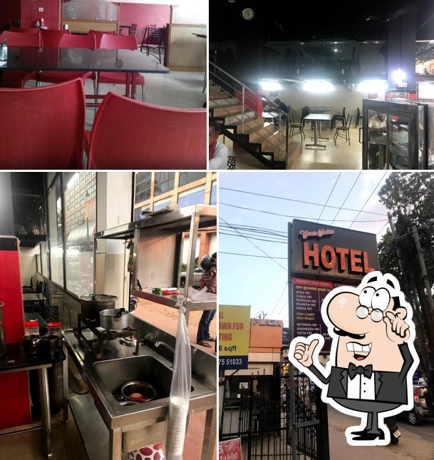 Take a seat at one of the tables at Hotel Your Choice