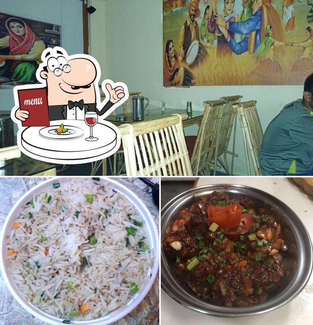 Check out the photo depicting food and dining table at Maa Di Hatti