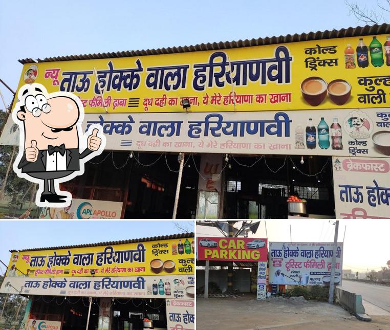 Here's an image of Tau hokke wala haryanvi tourist family dhaba