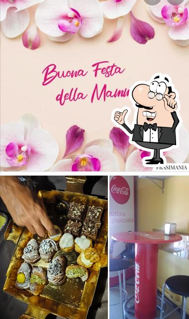 Dai un'occhiata agli interni di Pizzeria d'asporto Marconi