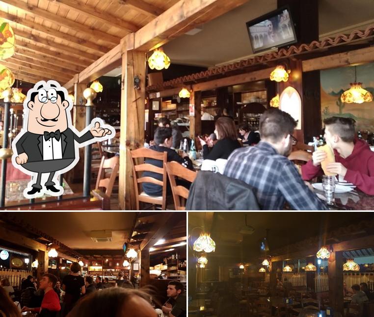 Siediti a un tavolo di Tivoli Pub