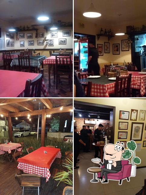 Sente em uma das mesas no Baggio Pizzeria & Focacceria - Blumenau