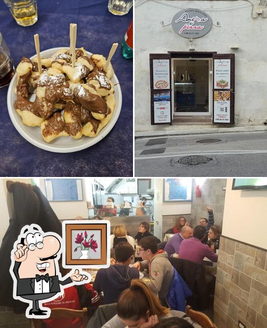 Tra le diverse cose da Anima e Pizza si possono trovare la interni e bevanda