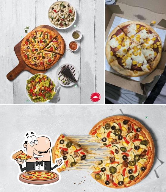 Pick pizza at Pizza Hut D B Mall, Gwalior