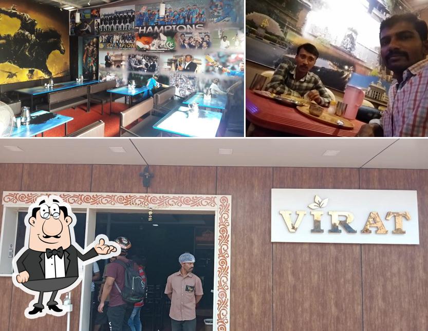 Take a seat at one of the tables at Hotel Virat