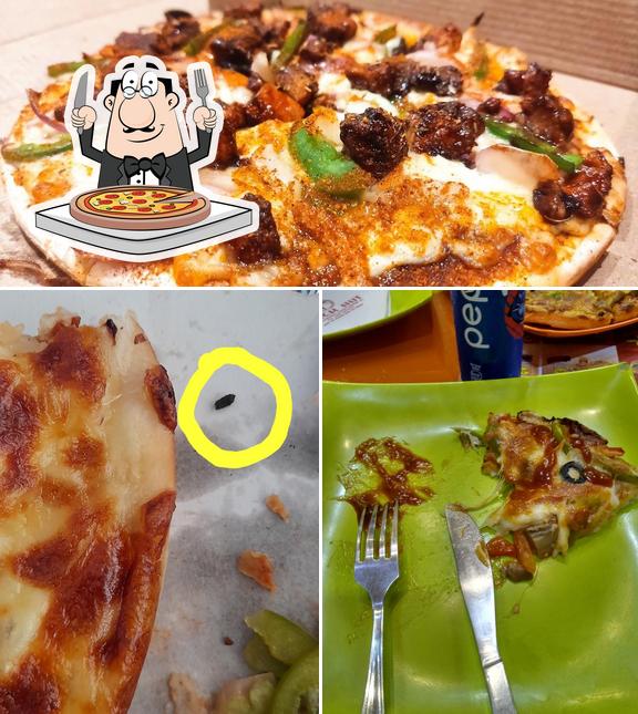 Try out pizza at Chicking Irinjalakuda