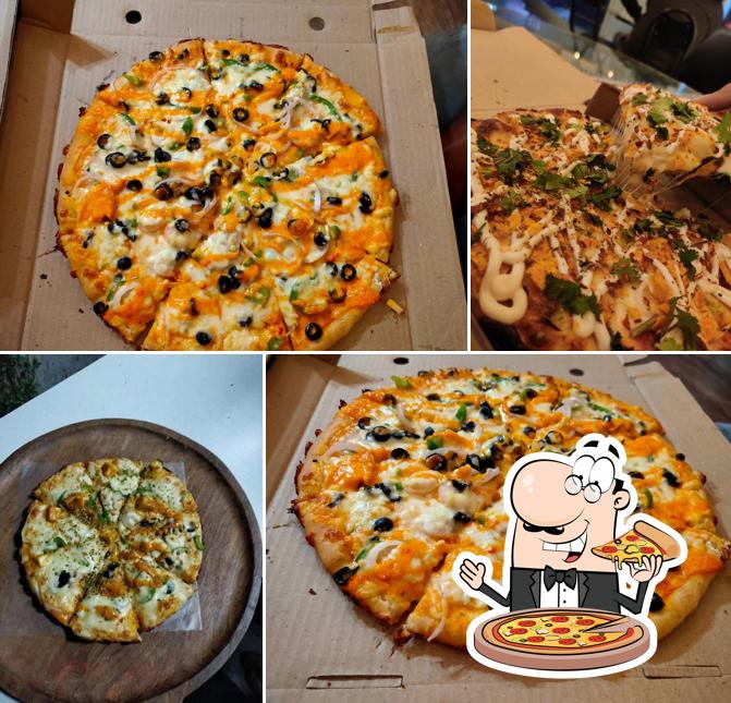 Get pizza at Sizzling Pizza