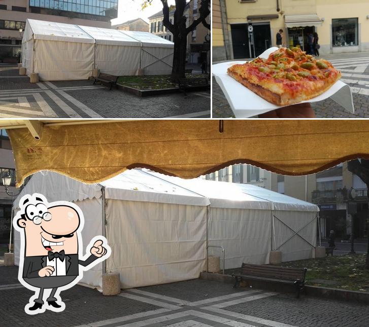 La foto della interni e pizza di Pizzeria Tubino