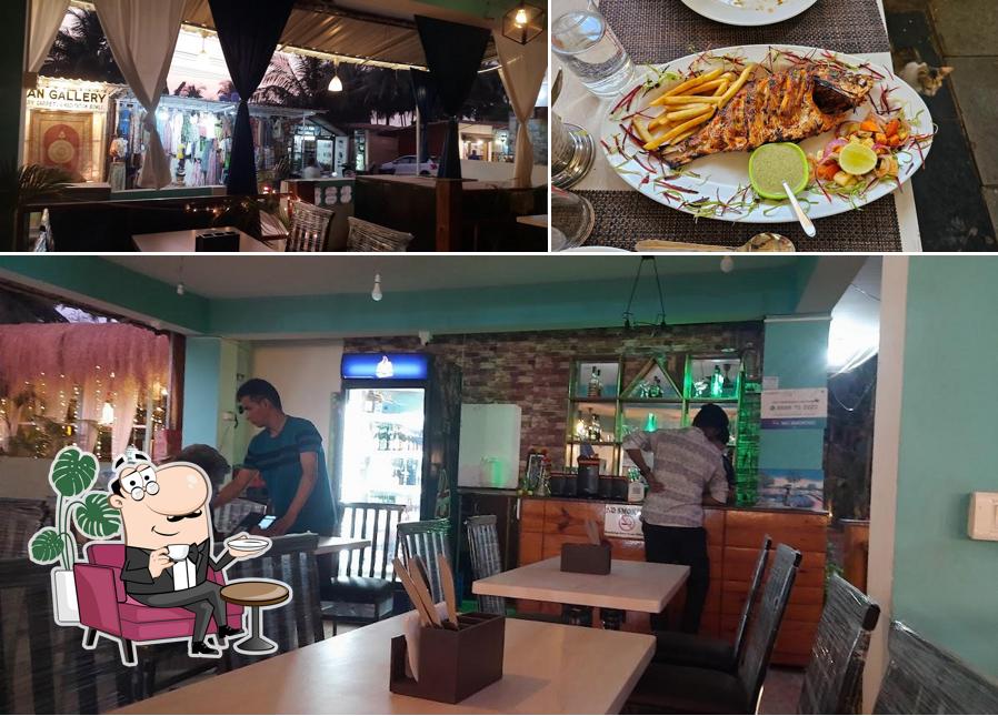 Take a seat at one of the tables at THE SINGH'S FAMILY MULTICUISINE AC RESTAURANT & BAR