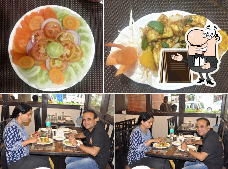 This is the picture depicting exterior and food at De Veg