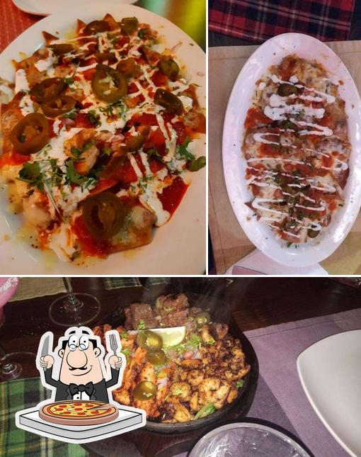 At De Fish House Seafood Restaurant, you can taste pizza