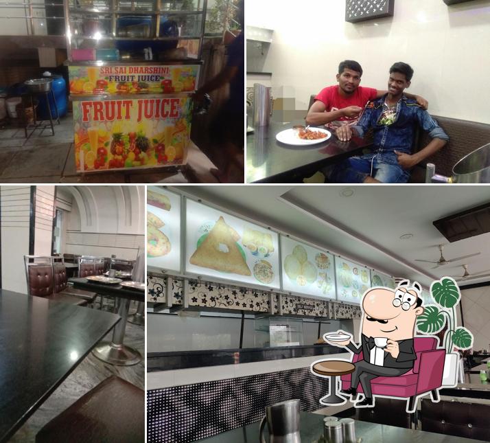 Take a seat at one of the tables at Sri Darshini Tiffin And Meals