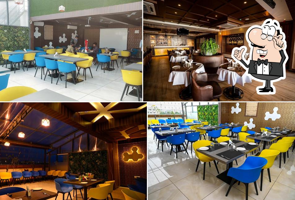 Take a seat at one of the tables at The Bistro @ Global Village R.R. Nagar