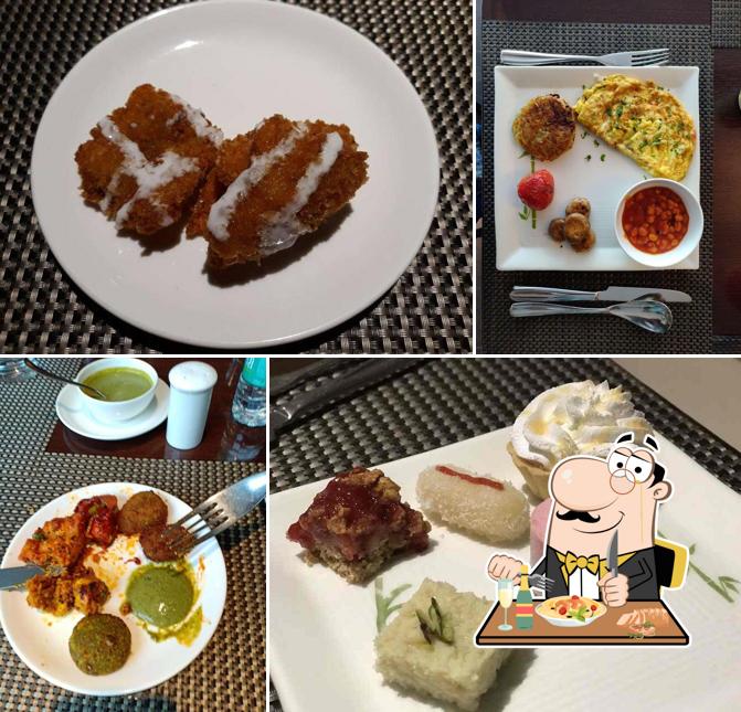 Food at Oriental Fusion Restaurant - Ramee Grand Hotel