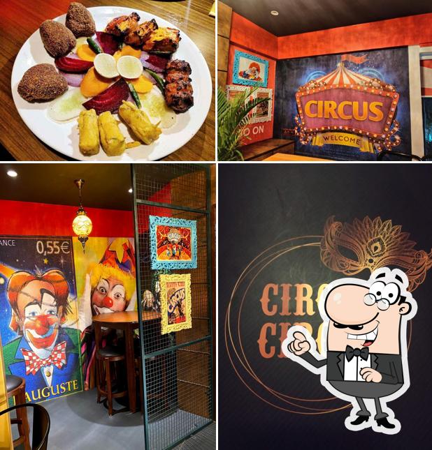 Take a seat at one of the tables at CIRCUS CIRCUS, Restaurant,Bar & Eatery