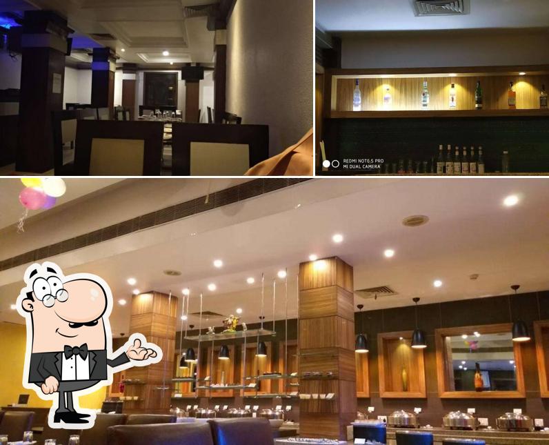 The picture of interior and wine at Charcoal Grill