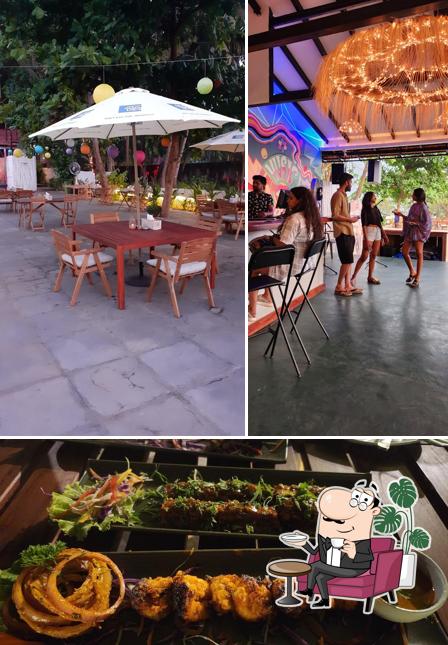 The image of Backwaters Morjim Goa’s interior and food