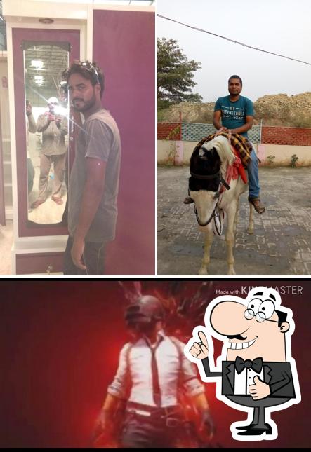 Here's a photo of Happy Family Restaurant and Hotel