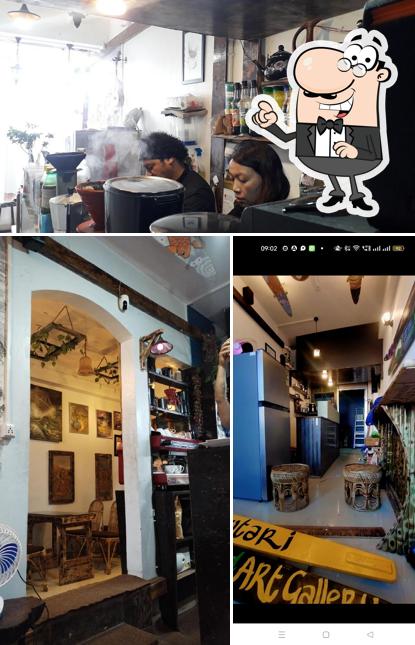 Take a seat at one of the tables at Cafe Chowtari