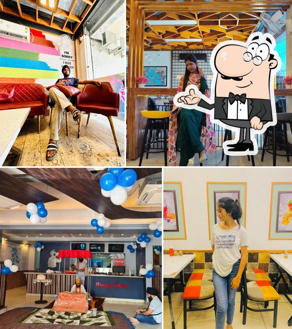 Take a seat at one of the tables at Hungry Point - Ropar