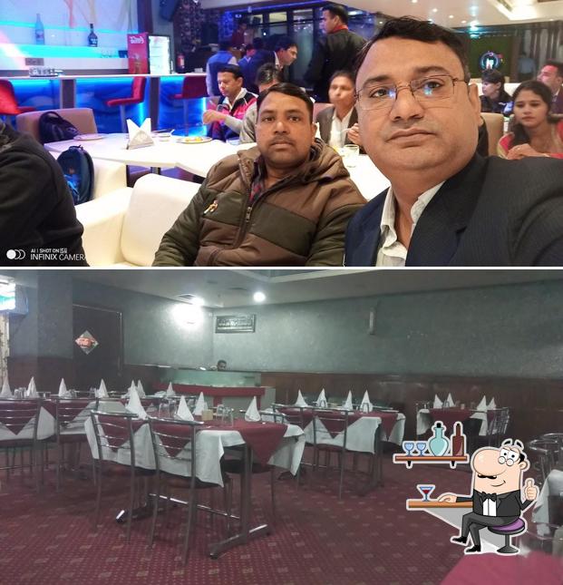 Take a seat at one of the tables at Karim's