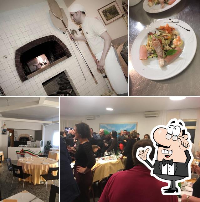 Siediti a un tavolo di Hotel Ristorante Pizzeria La Marinella