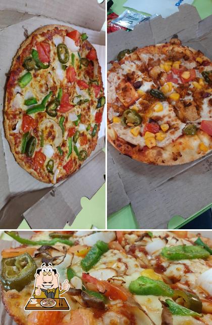 Get pizza at Domino's Pizza Kuvempu Nagar, Davanagere