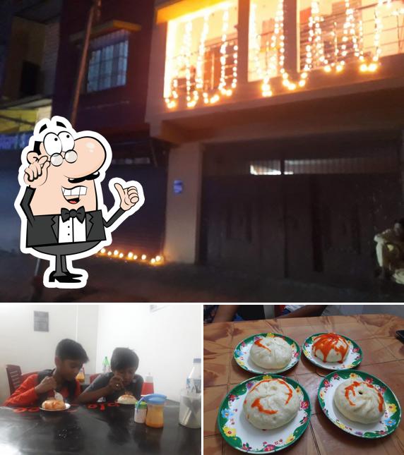 This is the picture depicting interior and food at Apple Trees restaurant