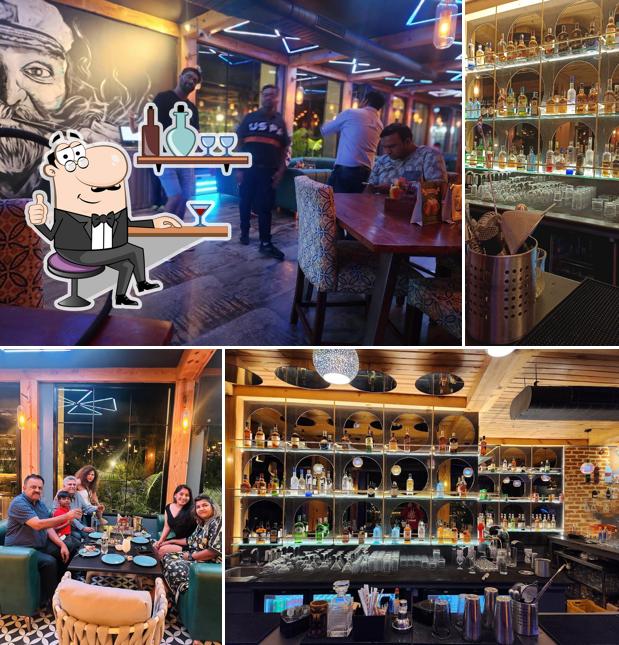 Take a seat at one of the tables at Lord of the Drinks - Tarangi