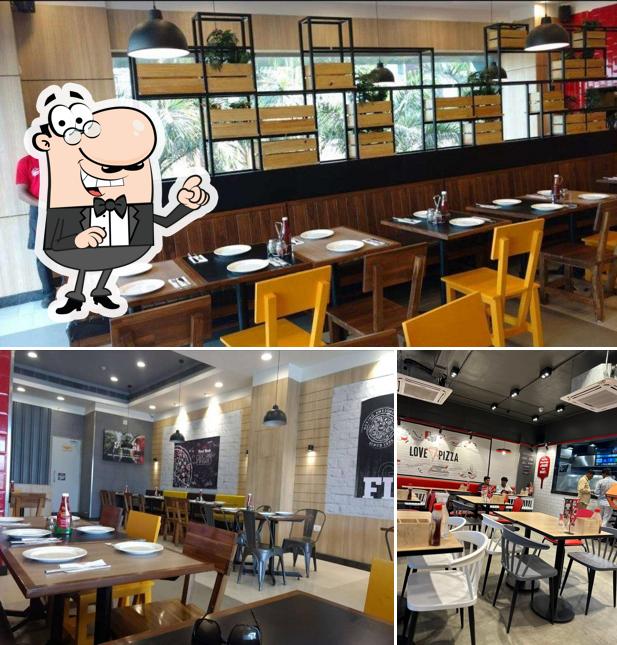 The interior of Pizza Hut Raiya Chowk, Rajkot