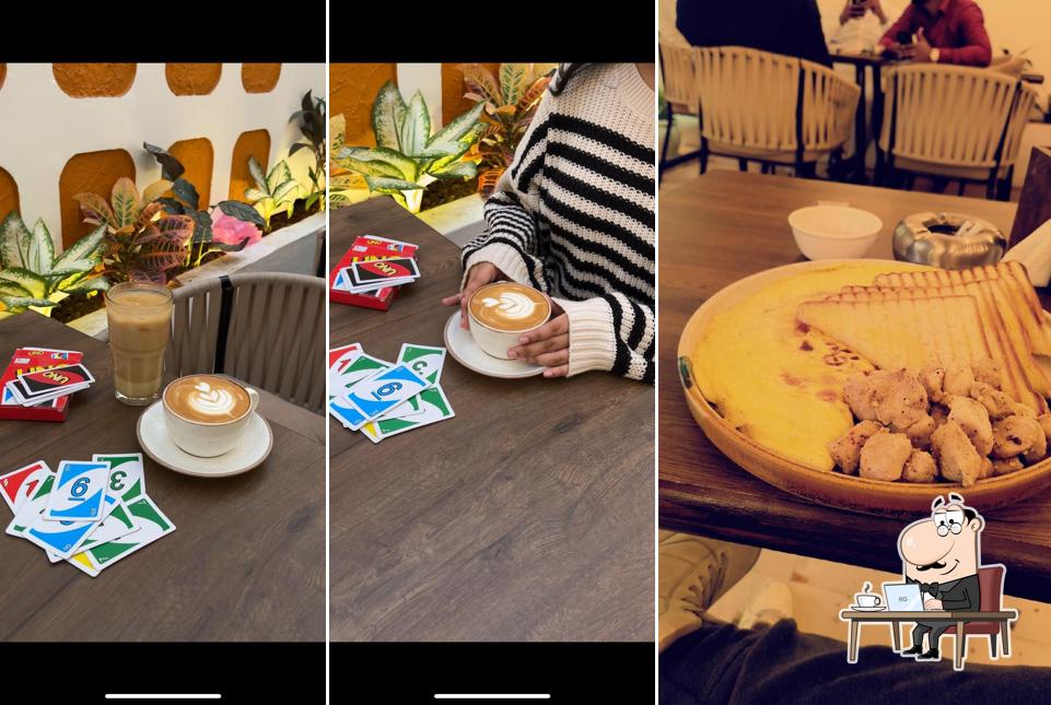 Take a seat at one of the tables at Qehhwa Cafe