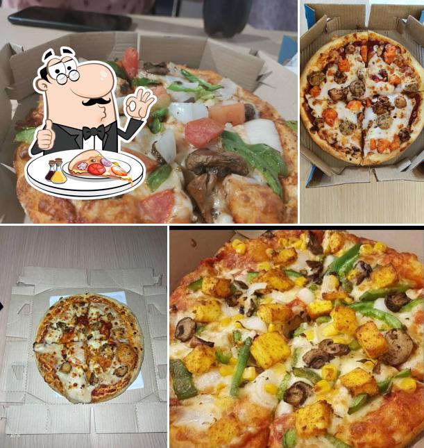 At Domino's Pizza Ambalamukku, Thiruvananthapuram, you can get pizza