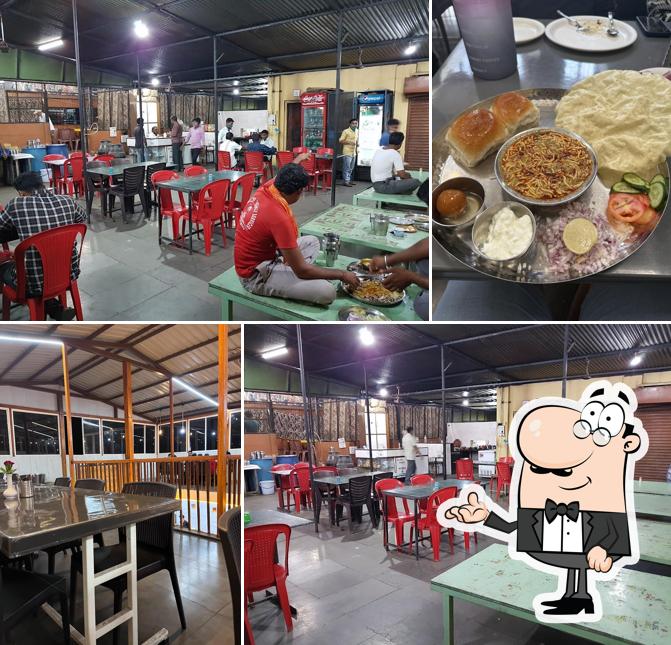 Take a seat at one of the tables at Hotel Mauli