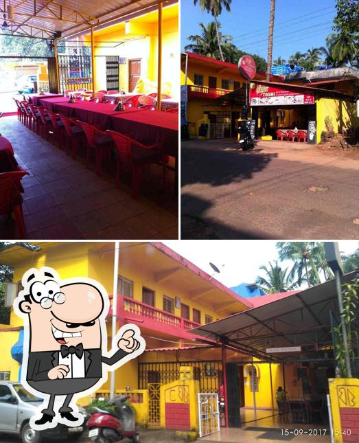 Among different things one can find exterior and dining table at Why Not Tashi Bar and Restaurant