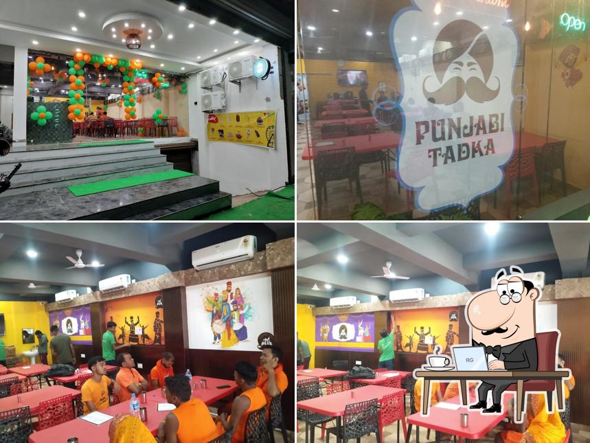 Take a seat at one of the tables at Punjabi Tadka - A Pure Veg Restaurant