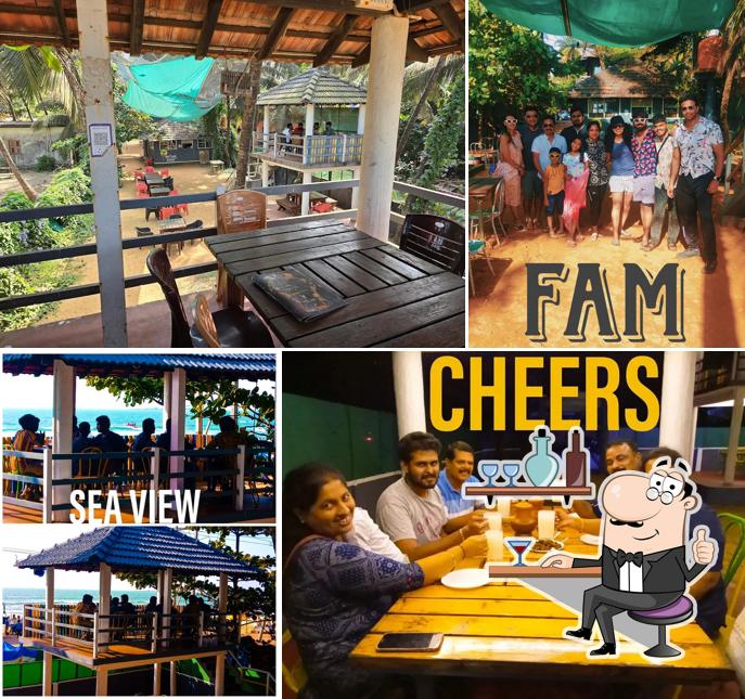 Take a seat at one of the tables at KALIYUGA Toddy Cafe