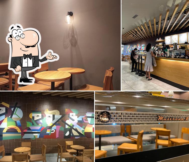 Take a seat at one of the tables at Starbucks