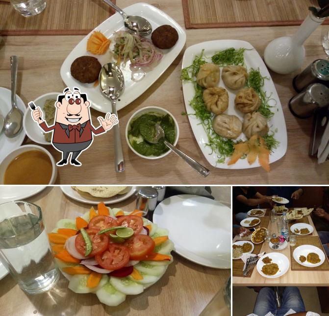 Among different things one can find food and dining table at Kaka Ka Sekuwa