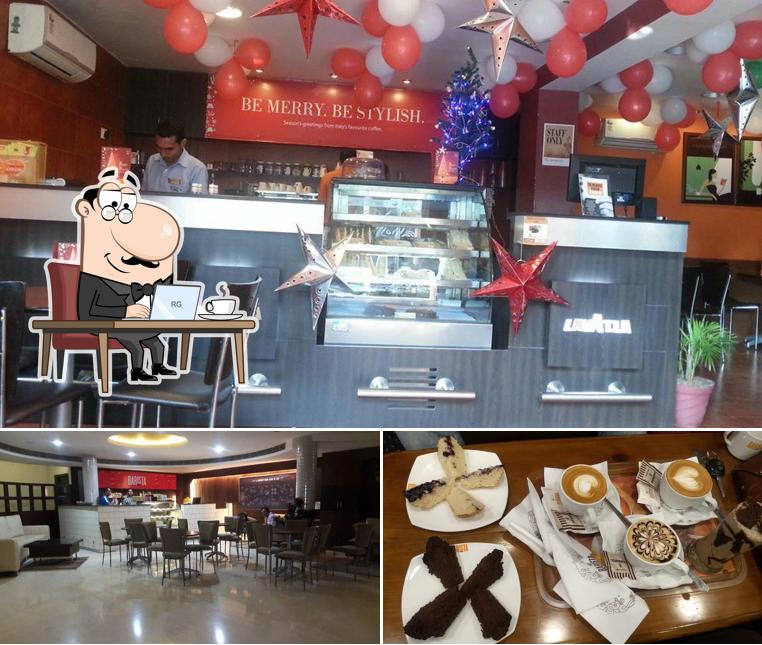 Among various things one can find interior and food at Barista Lavazza