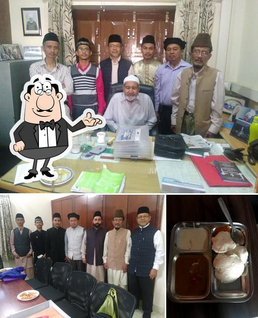 Check out the picture showing interior and dessert at South Indian Hotel