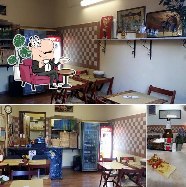 La foto della interni e birra di New Pizza (pizza al metro)