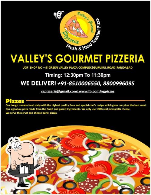 Look at the image of Pizza & food cafeteria