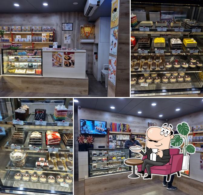 Take a seat at one of the tables at Atul Bakery Jamnagar