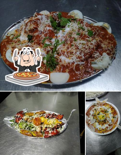 Pick pizza at Sai Angan Rohit Restaurant and bar