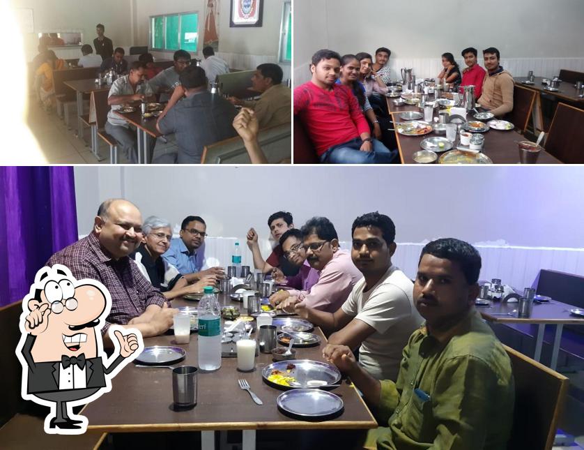 The interior of Shree Giriraj Kathiyawadi Family Restaurant