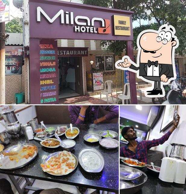 Among different things one can find interior and dining table at Milan Restaurant