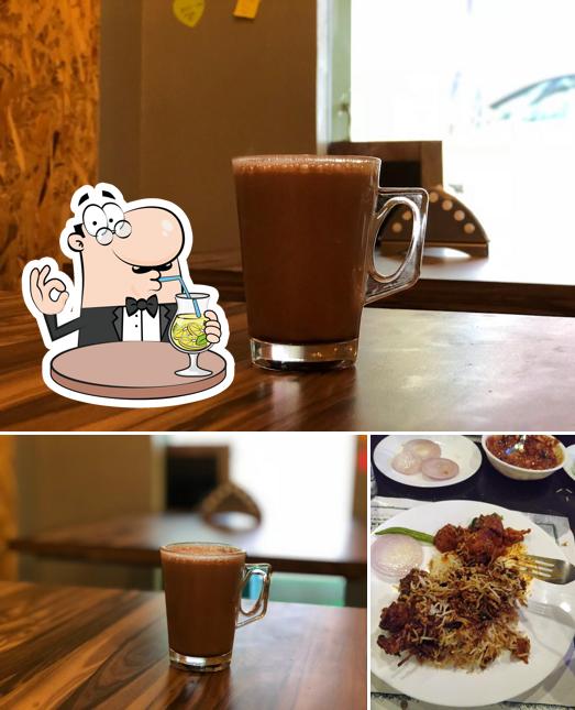 This is the photo depicting drink and food at Alpaharam's Kitchen Secret's