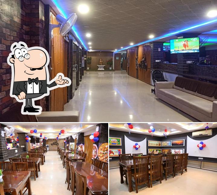 Take a seat at one of the tables at Hotel Center Point