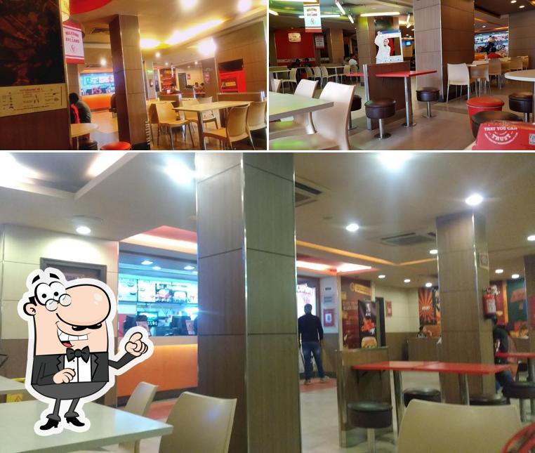 Take a seat at one of the tables at KFC