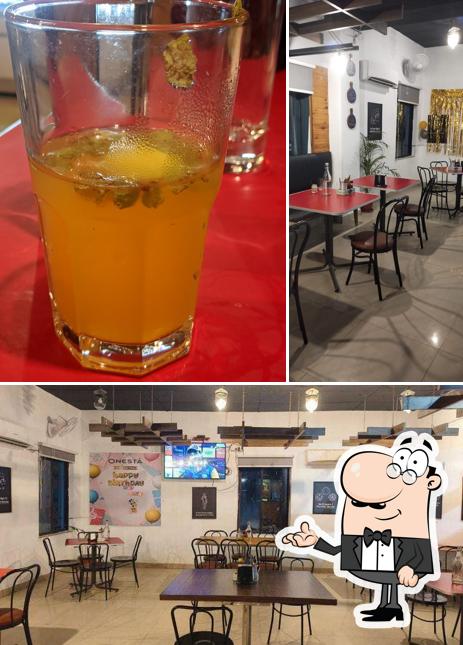 The image of interior and beer at Onesta Gachi Bowli